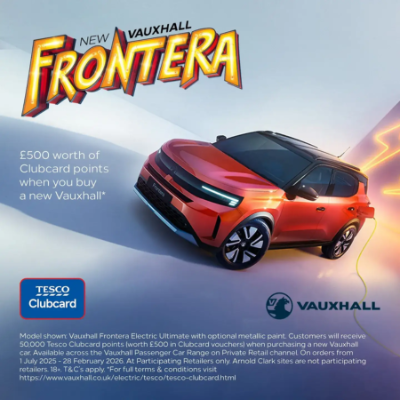 Red Vauxhall Frontera with promotional text and logos for Tesco Clubcard and Vauxhall.